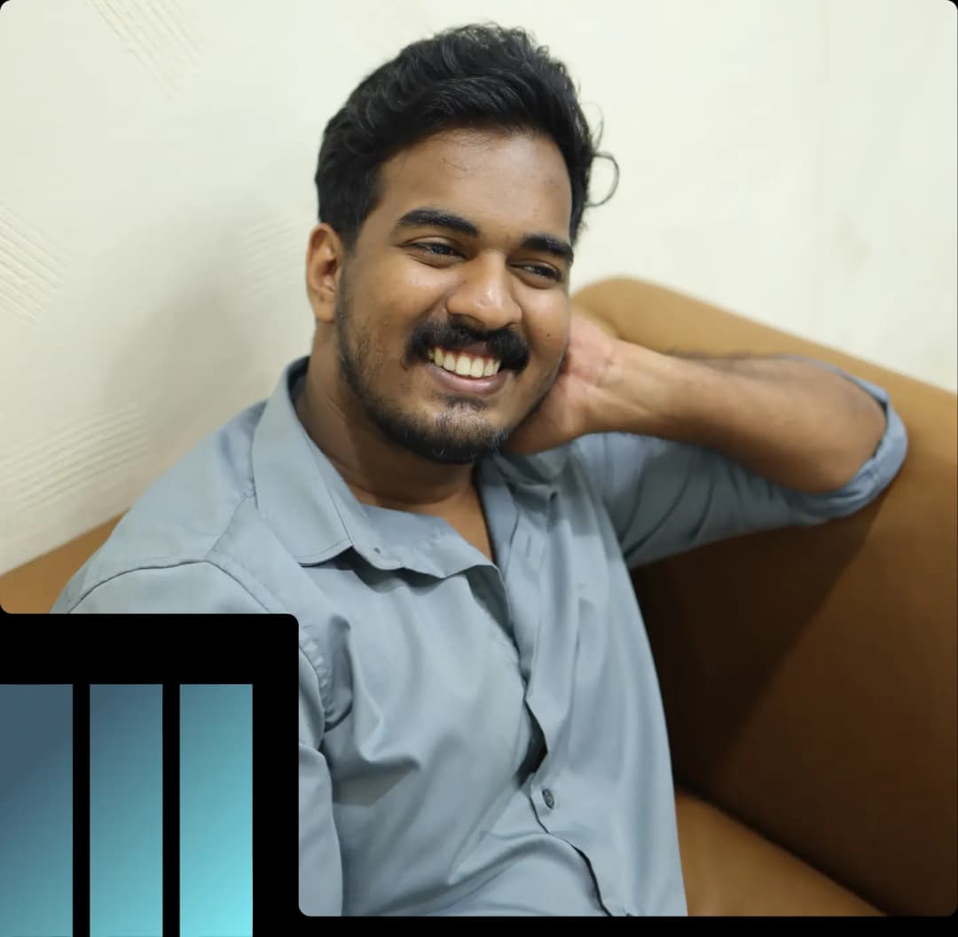 Team member smiling while discussing performance marketing results at Why Shy by Aventus.